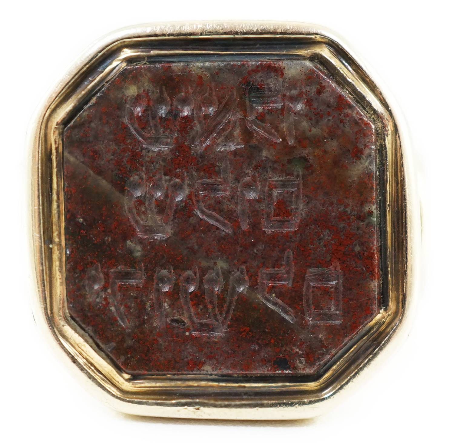 Judaica: A 19th century gold and jasper set ring, the stone carved with Hebrew script